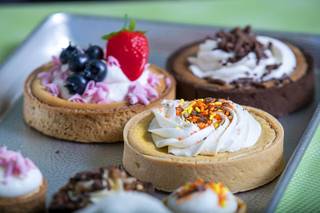 Samples of mini-pies, tarts and cakes are displayed at Caked Las Vegas, 7175 W. Lake Mead Blvd., Tuesday, Oct. 29, 2019.