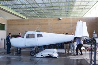 Students of Rancho High School's Academy of Aviation move airplane parts around the workspace at Rancho High School in North Las Vegas on Monday, Nov. 18, 2019. 
