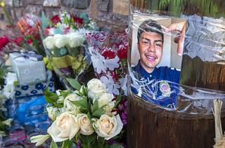 A photo of Kevin Soriano, 17, is shown at a makeshift memorial on the 2600 block of Ferguson Avenue in North Las Vegas Thursday, Dec. 5, 2019. Soriano was killed when he confronted a thief who took the family's pickup truck on Saturday, Nov. 30. His father was also shot and injured.