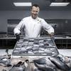 Olivier Dubreuil, vice president of culinary operations for the Venetian, poses for a photo with sustainably sourced fish.  