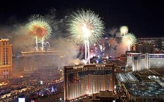 America's Party, the New Year's Eve fireworks spectacular, is seen above the Las Vegas Strip from the vantage point of the Trump International Hotel in Las Vegas on Wednesday, Jan. 1, 2020, in Las Vegas. 