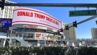 A series of anti-Trump ads paid for by democratic presidential candidate Mike Bloomberg run on a digital billboard located on the corner of Harmon Ave. and Las Vegas Blvd. on the Strip Friday, Feb. 21, 2020.