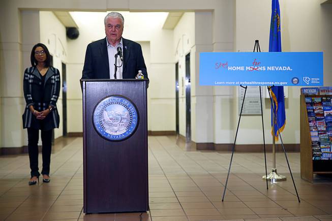 Nevada Gov. Steve Sisolak speaks during a news conference at the Sawyer State Building in Las Vegas,Tuesday, March 17, 2020. Sisolak ordered a monthlong closure of casinos and other non-essential businesses in order to stem the spread of the new coronavirus (COVID-19).