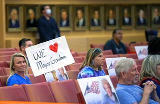 A woman holds a sign in support of Las Vegas Mayor Carolyn Goodman during a city council meeting at Las Vegas City Hall in downtown Las Vegas Wednesday, May 6, 2020.