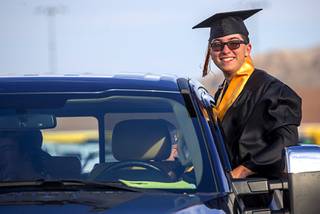 Conor Moore poses in his pickup truck as he waits for the start of the Faith Lutheran High School graduation at the Las Vegas Motor Speedway Friday, May 22, 2020. Seniors listened to speakers via a radio broadcast in their cars, then received their diplomas and took a 
