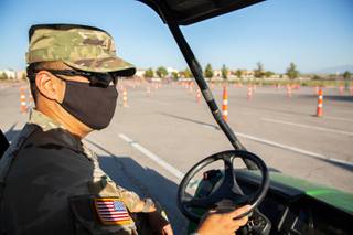 2nd Lieutenant Gideon Brillantes of the Nevada National Guard explains the procedures in place at the new COVID-19 testing centers at Sam Boyd Stadium, Monday Aug. 31, 2020.