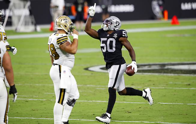 Las Vegas Raiders linebacker Nicholas Morrow (50) celebrates an interception in the first half during the Raiders' first home game against the New Orleans Saints at Allegiant Stadium Monday, Sept. 21, 2020.