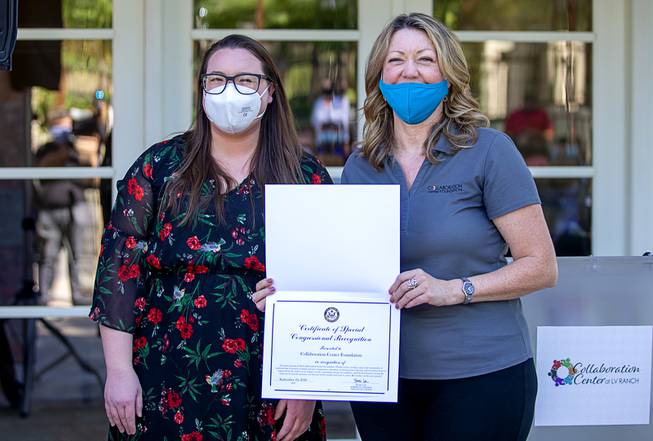 Gabby Everett, left, representing Congresswoman Susie Lee, poses Lynda Tache, president and CEO of the Collaboration Center Foundation, during the official opening of the Collaboration Center at LV Ranch Thursday, Sept. 24, 2020. Everett presented the Collaboration Center with a certificate of Congressional recognition.