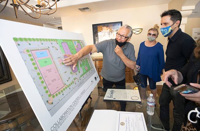 Steve Koontz, operation/events manager for the Collaboration Center Foundation, goes over site plans with guests during the official opening of the Collaboration Center at LV Ranch Thursday, Sept. 24, 2020. The new campus will provide support services, therapy, group classes and recreation to individuals with disabilities.