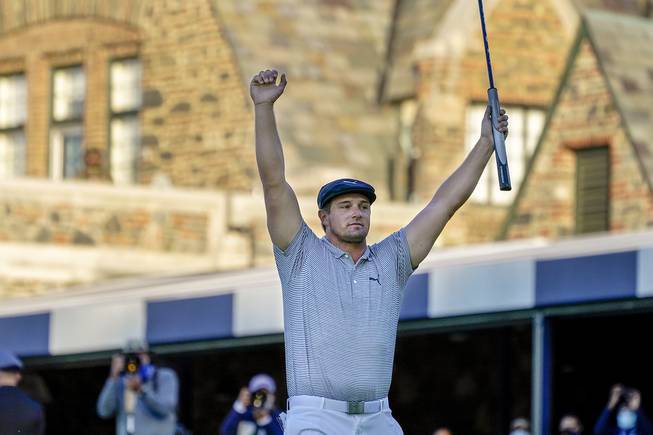 Bryson DeChambeau, of the United States, reacts after sinking a putt for par on the 18th hole to win the US Open Golf Championship, Sunday, Sept. 20, 2020, in Mamaroneck, N.Y. 