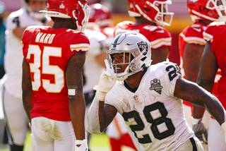 Las Vegas Raiders running back Josh Jacobs celebrates after scoring on a 7-yard touchdown run during the second half of an NFL football game against the Kansas City Chiefs, Sunday, Oct. 11, 2020, in Kansas City. 