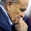 Former New York Mayor Rudy Giuliani pauses while addressing supporters of President Donald Trump supporters Monday, Oct. 12, 2020 during a Columbus Day gathering at a Trump campaign field office in Philadelphia.

