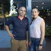 Nery Martinez poses with his wife Rosa Ramos in their backyard in Las Vegas Friday, Oct. 16, 2020. Martinez lost his job as a bartender in the COVID-19 shutdown and is waiting to be called back. 