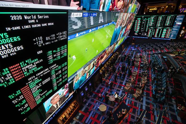 Invited guests get an early look at the three-story sports book before the opening of Circa in downtown Las Vegas Tuesday, Oct. 27, 2020. 