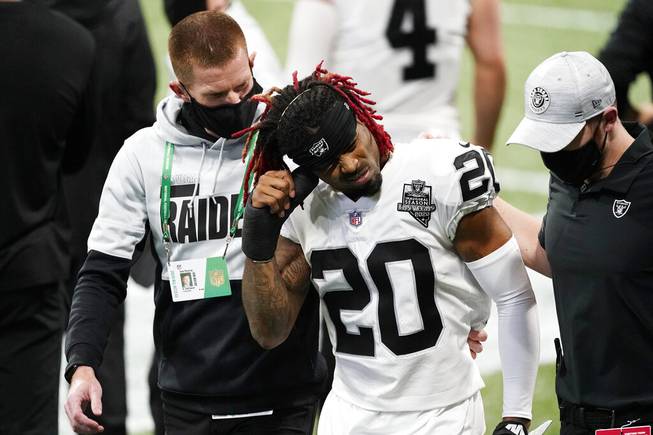 Las Vegas Raiders cornerback Damon Arnette (20) walks off the field after injury against the Atlanta Falcons during the first half of an NFL football game, Sunday, Nov. 29, 2020, in Atlanta. 


