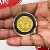 A 1-ounce gold coin believed to have a value of $1,800-$2,000 was dropped into a Las Vegas Salvation Army kettle. A 1-ounce gold coin believed to have a value of $1,800-$2,000 was dropped into a Las Vegas Salvation Army kettle.