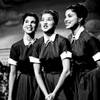 The McGuire Sisters are shown during a performance on Nov. 6, 1953. From left are Christine, Phyllis and Dorothy McGuire. 