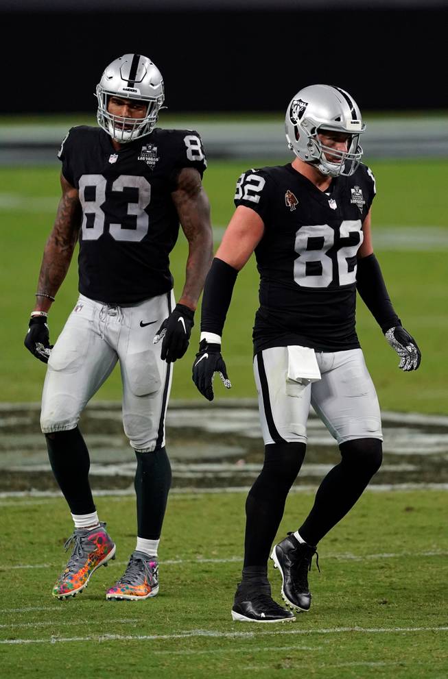 Las Vegas Raiders tight ends Darren Waller #83 and Jason Witten #82 line up against the New Orleans Saints during an NFL football game, Monday, Sept. 21, 2020, in Las Vegas.