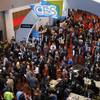 In this Jan. 7, 2020, file photo, crowds enter the convention center on the first day of the CES tech show, in Las Vegas.
