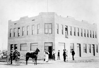 A view of Hotel Nevada after its opening in 1906 in downtown Las Vegas. Founder J.F. Miller is seated in the carriage. The Golden Gate Casino was opened in hotel in 1955. The property was renamed Golden Gate Hotel and Casino in 1974.