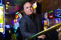 Tim Brooks poses for a photo at his casino, Emerald Island, in downtown Henderson,Thursday, March 11, 2021.