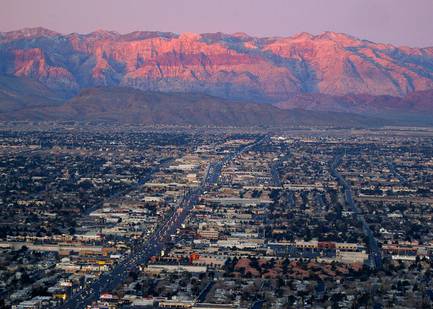 This Feb. 9, 2005, file photo, shows the suburbs of Las Vegas from atop the Stratosphere tower looking west down Sahara Avenue toward the Spring Mountains.