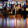 In this June 24, 2021, file photo, crowds walk through the casino during the opening night of Resorts World Las Vegas in Las Vegas. In this June 24, 2021, file photo, crowds walk through the casino during the opening night of Resorts World Las Vegas in Las Vegas.
