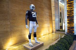 A mannequin is displayed with a Raiders uniform in the lobby of the M Resort in Henderson Wednesday, Aug. 4, 2021. The resort is the Official Raiders Team Headquarters Hotel.