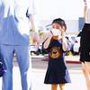 Elena Choi, 5 years old, puts on her mask as she starts kindergarten during the first day of school at the new Hannah Marie Brown Elementary School in Henderson, Monday, Aug. 9, 2021. Elena Choi, 5 years old, puts on her mask as she starts kindergarten during the first day of school at the new Hannah Marie Brown Elementary School in Henderson, Monday, Aug. 9, 2021.
