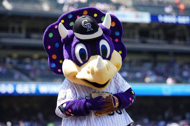 Colorado Rockies mascot Dinger in shown in the first inning of a baseball game in Denver, in this Sunday, July 18, 2021, file photo. 