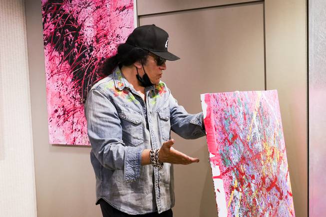 KISS singer and musician, Gene Simmons talks about his paintings, currently on display at Animazing Gallery inside the Grand Canal Shoppes at the Venetian, Thursday, Aug. 5, 2021. The pieces in Gene Simmons ArtWorks will be publicly debuted from Oct. 14 to 16, with a private opening-day reception and two days of public presentations. YASMINA CHAVEZ