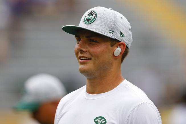 New York Jets quarterback Zach Wilson (2) warms up before an NFL preseason football game Saturday, Aug 21. 2021, between the New York Jets and Green Bay Packers in Green Bay, Wis. 