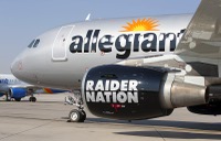 An Allegiant Air Airbus A319 passenger jet with a Raiders-themed paint job is displayed at McCarran International Airport Wednesday, Sept. 8, 2021.