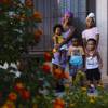 Desiree Robinson is shown Wednesday, Sept. 15, 2021, at her home in North Las Vegas with her children, from left, Nova, 1; Messiyah, 3; Malachi, 2; and Nalani, 9. Robinson’s husband, Michael Myers, was one of three people shot to death Sept. 1 in a string of apparently random shootings, North Las Vegas Police said. Myers’ death, Robinson said, has left the family scrambling, but she is grateful for the support the family has received from the community since the tragedy.