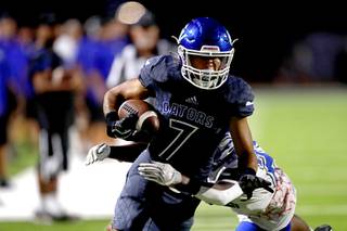 Green Valleys Anton Keeling (7) makes a touchdown run after a reception during the Henderson Bowl against Basic at Green Valley School in Henderson Friday, Sept. 24, 2021.