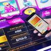 Rachelle Rabago, IGT director of casino systems product management, demonstrates cashless gaming technology as she transfers money from an IGT Pay resort wallet on a smartphone to a video slot machine during the Global Gaming Expo at the Venetian Expo, Tuesday, Oct. 5, 2021.