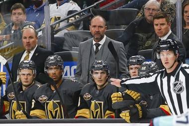 Vegas Golden Knights coach Peter DeBoer watches during the third period of the team’s NHL hockey game against the Seattle Kraken on Tuesday, Oct. 12, 2021, in Las Vegas.