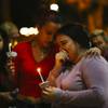 Valentina Astalos and Sanja Jagrovic mourn Friday, Nov. 5, 2021, during a vigil for Tina Tintor, a 23-year-old killed in a car crash involving former Raiders wide receiver Henry Ruggs. Astalos, Jagrovic and Tintor, all from Serbia, grew up together.