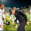 UNLV football coach Marcus Arroyo celebrates with wide receiver Kyle Williams (1) after the Rebels defeated New Mexico, 31-17, on Nov. 6, 2021. It was the program's first win since 2019, and the first win in Arroyo's coaching tenure. UNLV football coach Marcus Arroyo celebrates with wide receiver Kyle Williams (1) after the Rebels defeated New Mexico, 31-17, on Nov. 6, 2021. It was the program's first win since 2019, and the first win in Arroyo's coaching tenure.