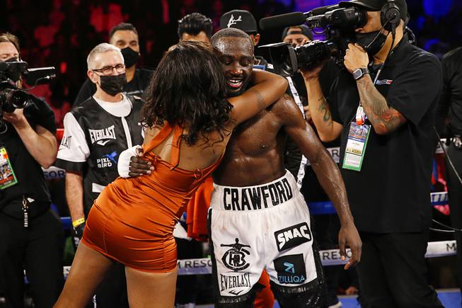 Terence Crawford celebrates after defeating Shawn Porter by TKO in a welterweight title boxing match Saturday, Nov. 20, 2021, in Las Vegas.