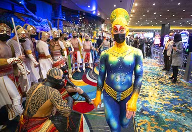 KA cast members arrive at the KA Theatre following a pop-up performance in the hotel lobby celebrating the return of KA by Cirque Du Soleil at MGM Grand Wednesday, Nov. 24, 2021.