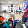 Byron Goynes, program director, talks with Dora Jackson, left, and Caseal Reed at the Martin Luther King Senior Center in North Las Vegas Thursday, Dec. 2, 2021. “We see the need is there, and as our seniors call and have a need, we’re just happy we’re able to fill it for them,” Goynes said.