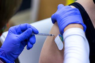 A woman gets a COVID-19 vaccine at the Horizon Ridge Wellness Clinic on East Flamingo Road Thursday, Dec. 23, 2021.