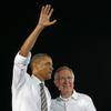President Barack Obama and Sen. Harry Reid wave to the crowd after a speech outside Orr Middle School at a "Moving America Forward" rally Friday, October 22, 2010.