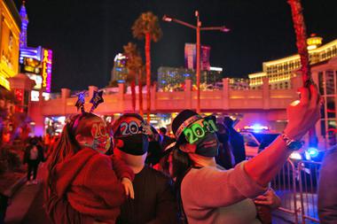 State public health officials again cautioned those gathering for crowded New Year’s Eve celebrations across Nevada to adhere to local COVID-19 mitigation guidelines to stem spread of the disease as ...