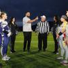 Raiders alumni Teyo Johnson assists referee Gerald Swanson with the coin toss during a flag football game between the Shadow Ridge Mustangs and Bonanza Bengals at Shadow Ridge High School Thursday, Jan. 13, 2022. Raiders alumni Teyo Johnson, center, conducted the coin toss.