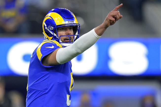 Los Angeles Rams quarterback Matthew Stafford (9) gestures during the second half of an NFL wild-card playoff football game against the Arizona Cardinals in Inglewood, Calif., Monday, Jan. 17, 2022. 


