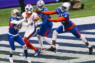 AFC wide receiver Stefan Diggs (14) gets blocked by players from the NFC  during the NFL Pro Bowl at Allegiant Stadium Sunday, Feb. 6, 2022.