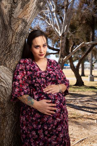 Erika Marquez, 34-year-old DACA recipient, poses for a portrait in a local park Tuesday Feb. 8, 2022. At 34 weeks into her pregnancy, she and her family worry about the high cost of medical expenses while not being able to qualify for Medicaid.