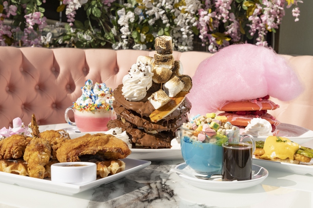 From left: Chicken and Waffles, Pink Unicorn Hot Chocolate,  Banana Nutella Lovers Pancakes, Lucky Charm Blue Latte, Pink Cloud Pancake Stack, and the Sugar Factory Eggs Benedict at Sugar Factory on Harmon Corner, Thursday, Feb. 10, 2022. YASMINA CHAVEZ
